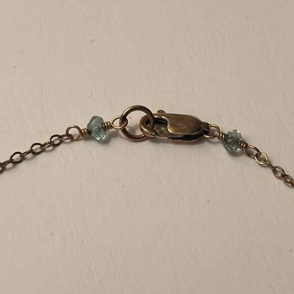 Dainty mint green faceted stone pendant on silver tone chain - Picture 3 of 3